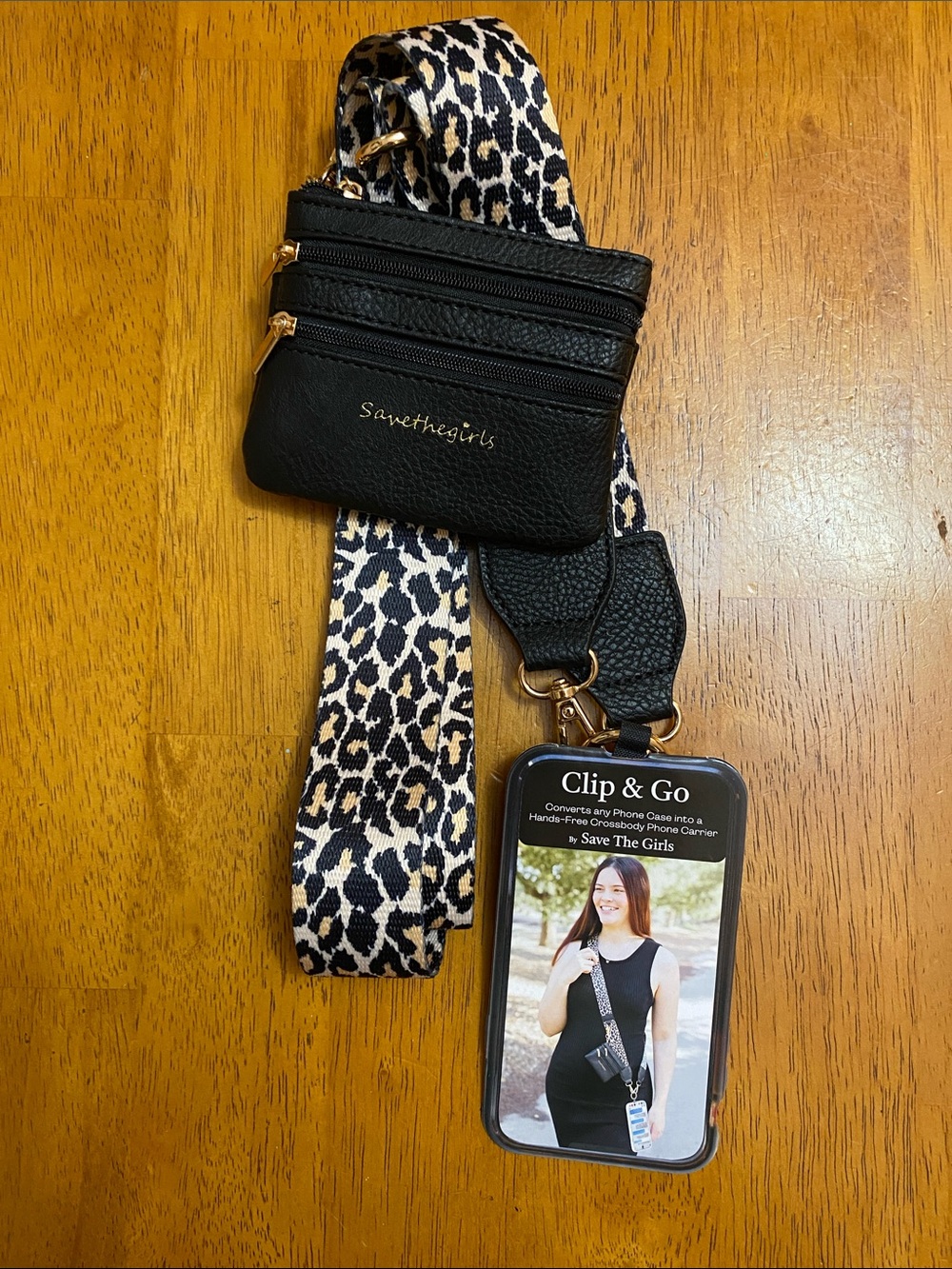 Save The Girls - Clip & Go, Cell Phone Crossbody Strap/Holder; Leopard Print.